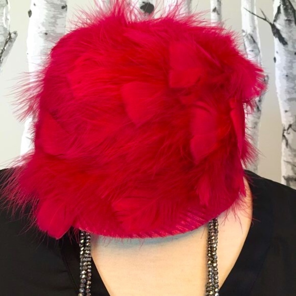 Vintage red feather straw hat.